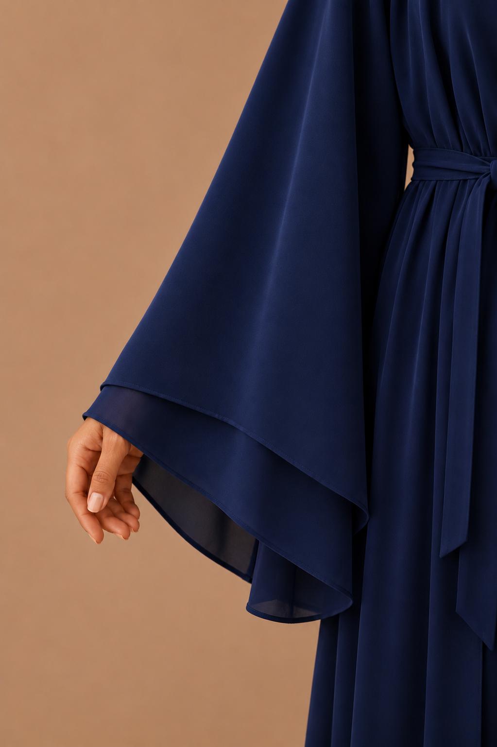 Blusas plisadas asimétricas