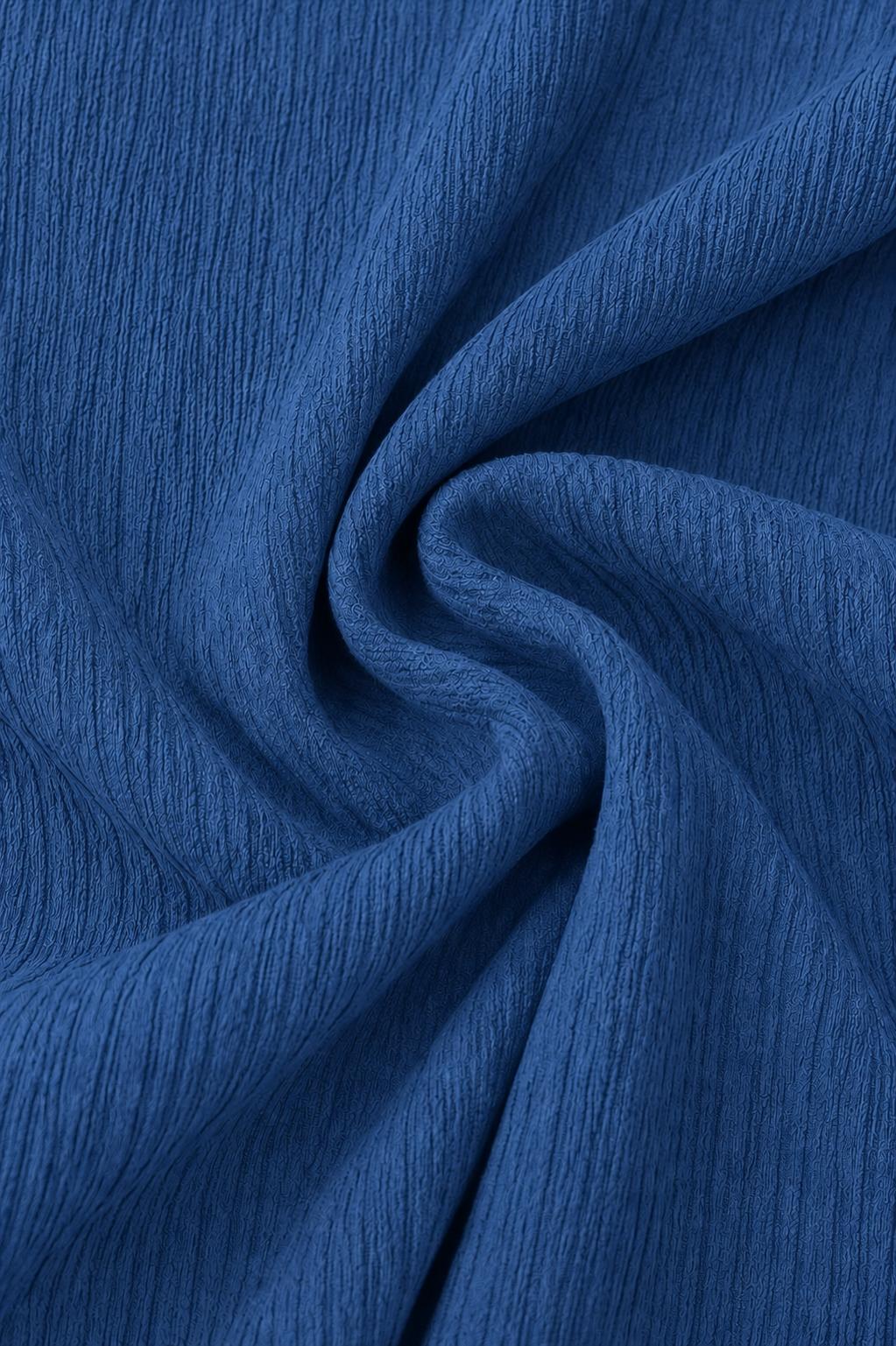 Blusas plisadas asimétricas