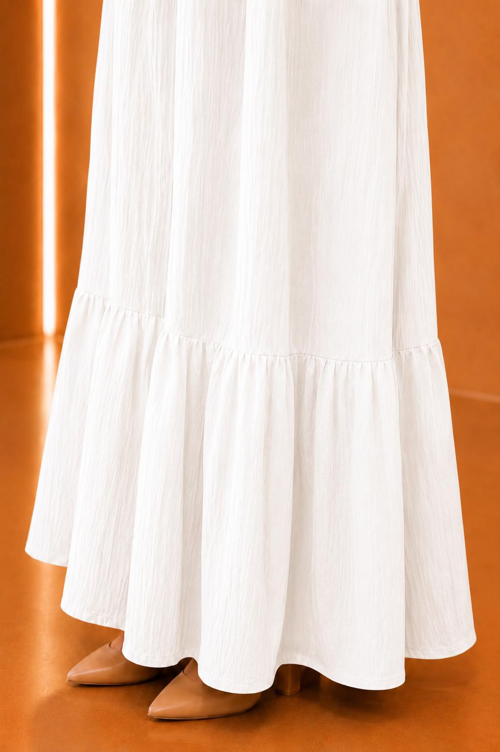 Blusas plisadas asimétricas
