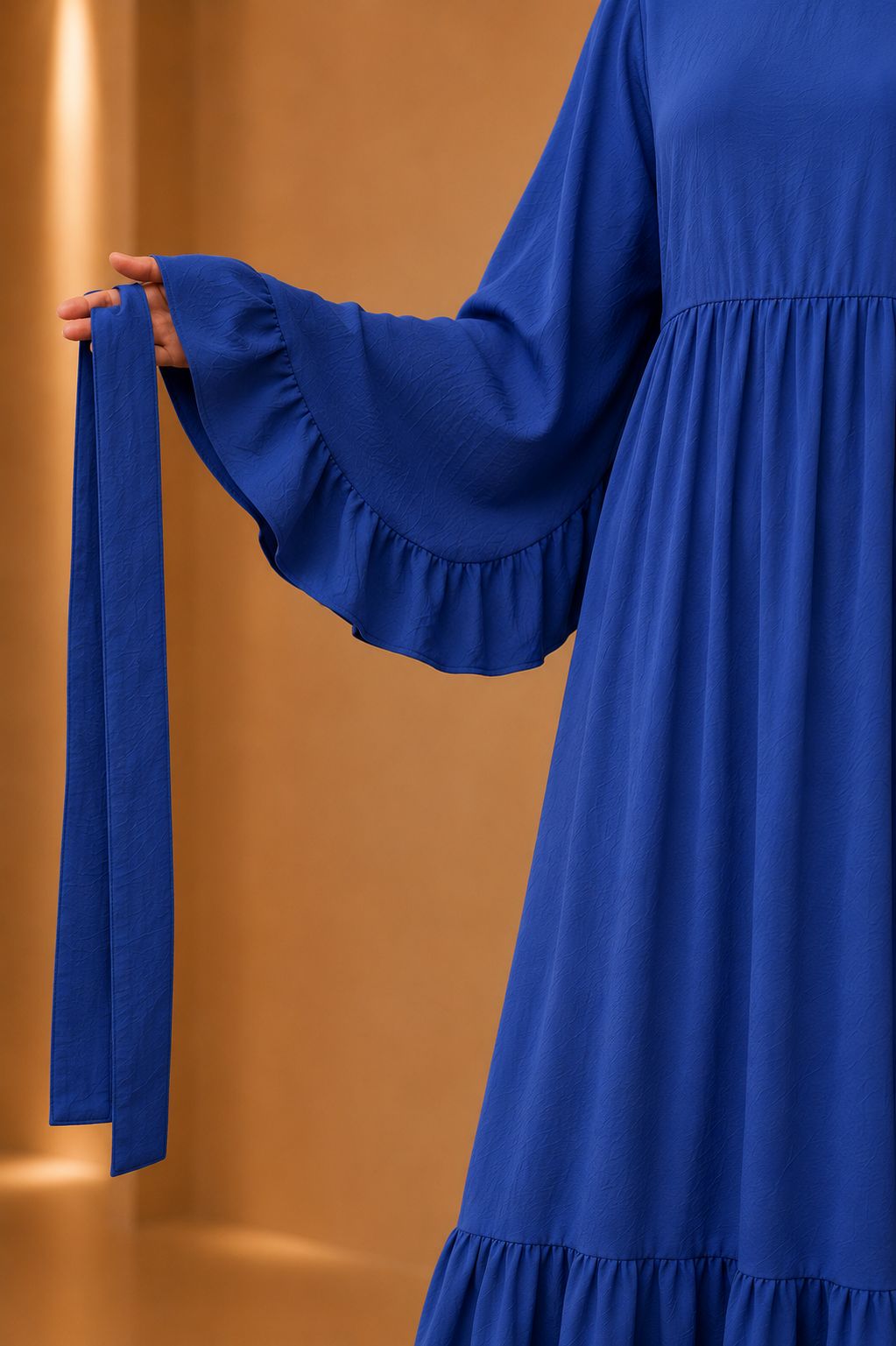Blusas plisadas asimétricas