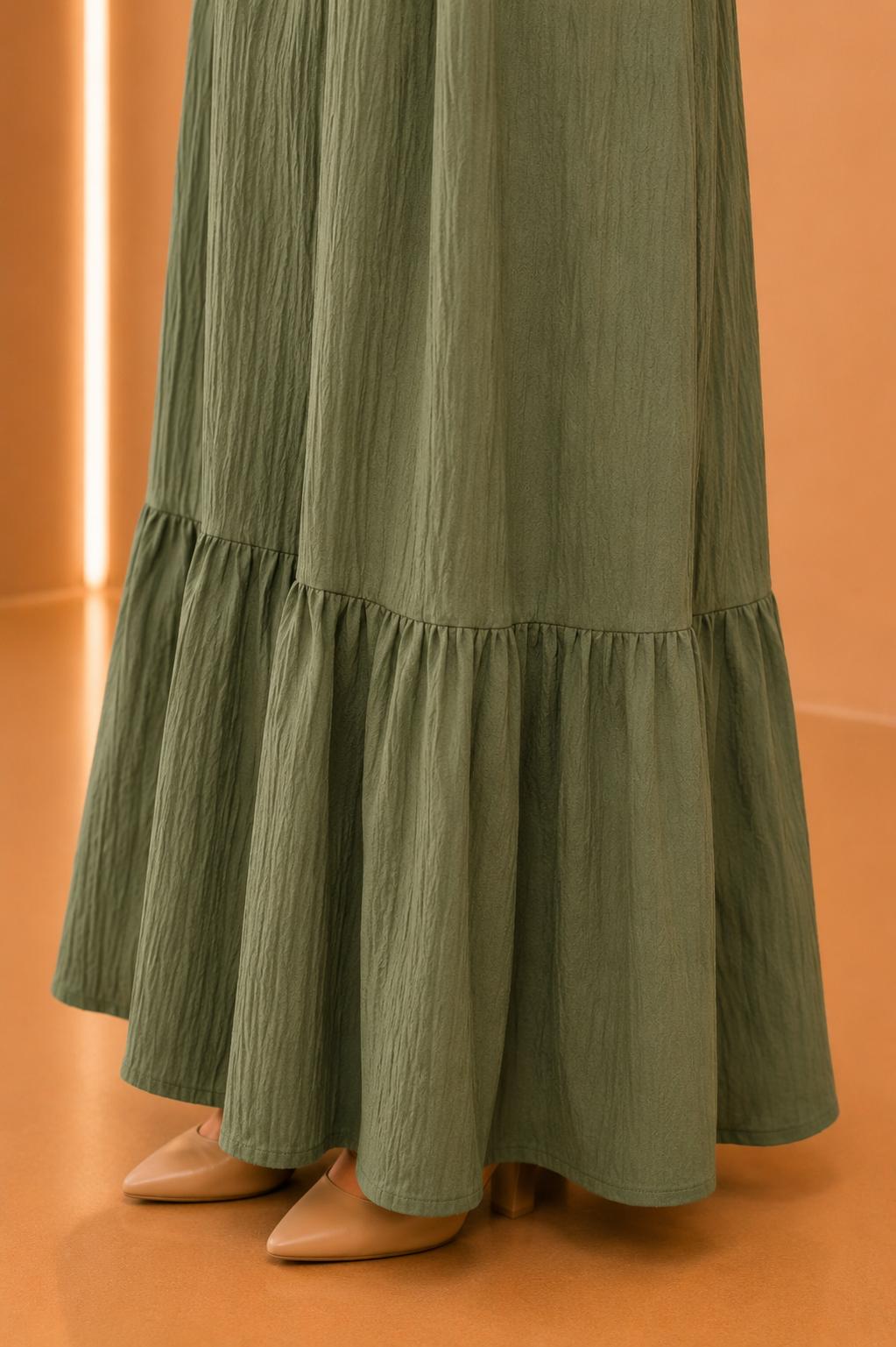 Blusas plisadas asimétricas